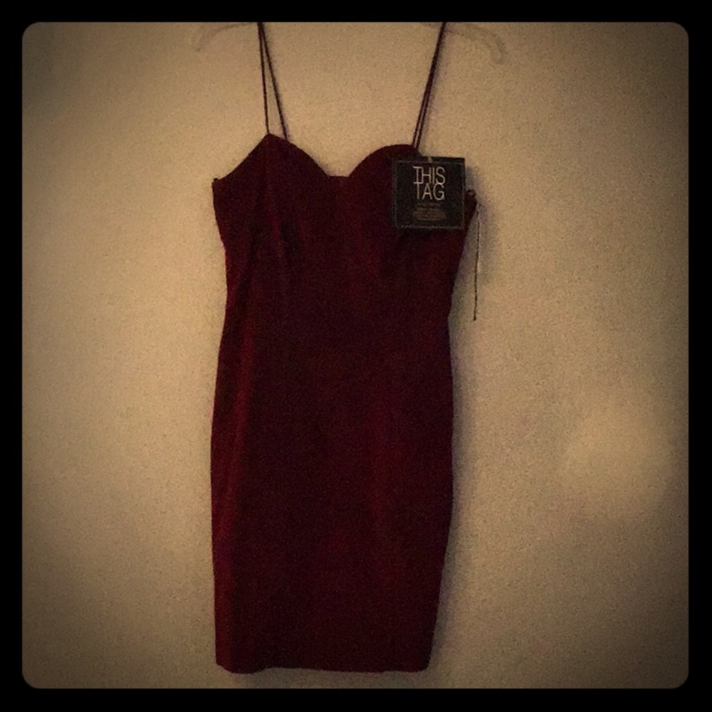 Spaghetti strap red velvet dress.